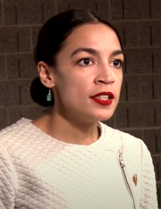 Alexandria Ocasio-Cortez answers questions at a town hall meeting
