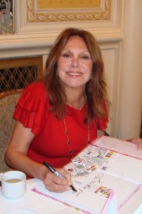 Marlo Thomas signing "Free to Be ... You and Me"