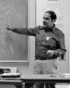 Jaime Escalante standing at the blackboard