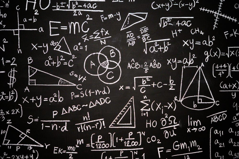 blackboard inscribed with scientific formulas calculations