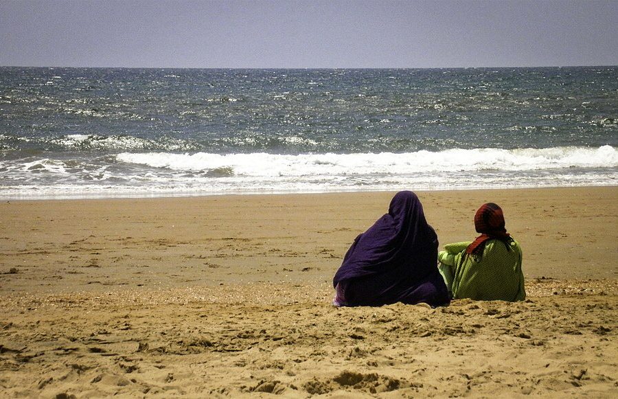 Muslim women at the beach
