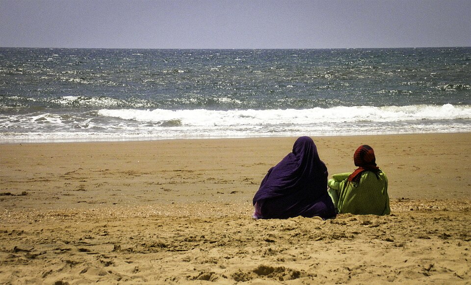 Muslim women at the beach