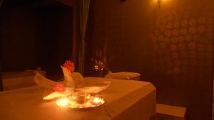 Spa room with candle